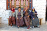 Four pilgrims, one too shy to be photographed, Changangkha Lhakhang.