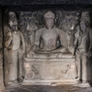 Eleven of the 12 caves are viharas or monasteries—rectangular, surrounded by monks' cells, and a sanctum at the back in which a serene Buddha sits flanked by two fly-whisk bearing Bodhisattvas. This is inside Cave 12.